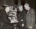 Chief Clerk Arthur Ohnimus, former Speaker Charles Lyons, Supt. of Bldgs and Grounds George Killiam (retiring after 25 years), 1947.