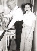 Ohnimus with Bernice in kitchen, circa early 1960s