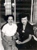Bernice Ohnimus at home with lady, circa late 1950s