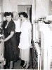 Arthur and Bernice Ohnimus and lady in kitchen, circa late 1950s