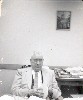 Ohnimus at desk, clerk's office, circa late 1950s