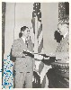 Ohnimus presenting resolution to Assemblyman Elywn Bennett (D-LA), circa 1943-50.