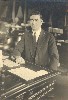 Ohnimus at Member's desk in Assembly Chamber, 1923 (his first year as Chief Clerk).