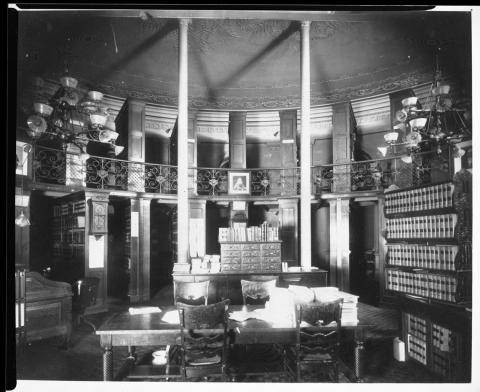 Interior photo of the apse showing State Library. Circa early 1900s.