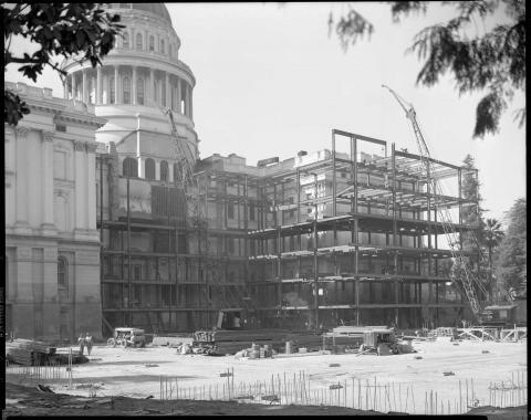Capitol Annex under construction, October 1949. Former apse area exposed during erection of steel beams (black and white photo).